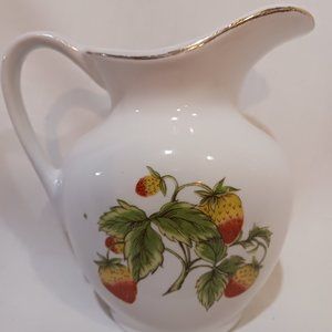 Pitcher with strawberries